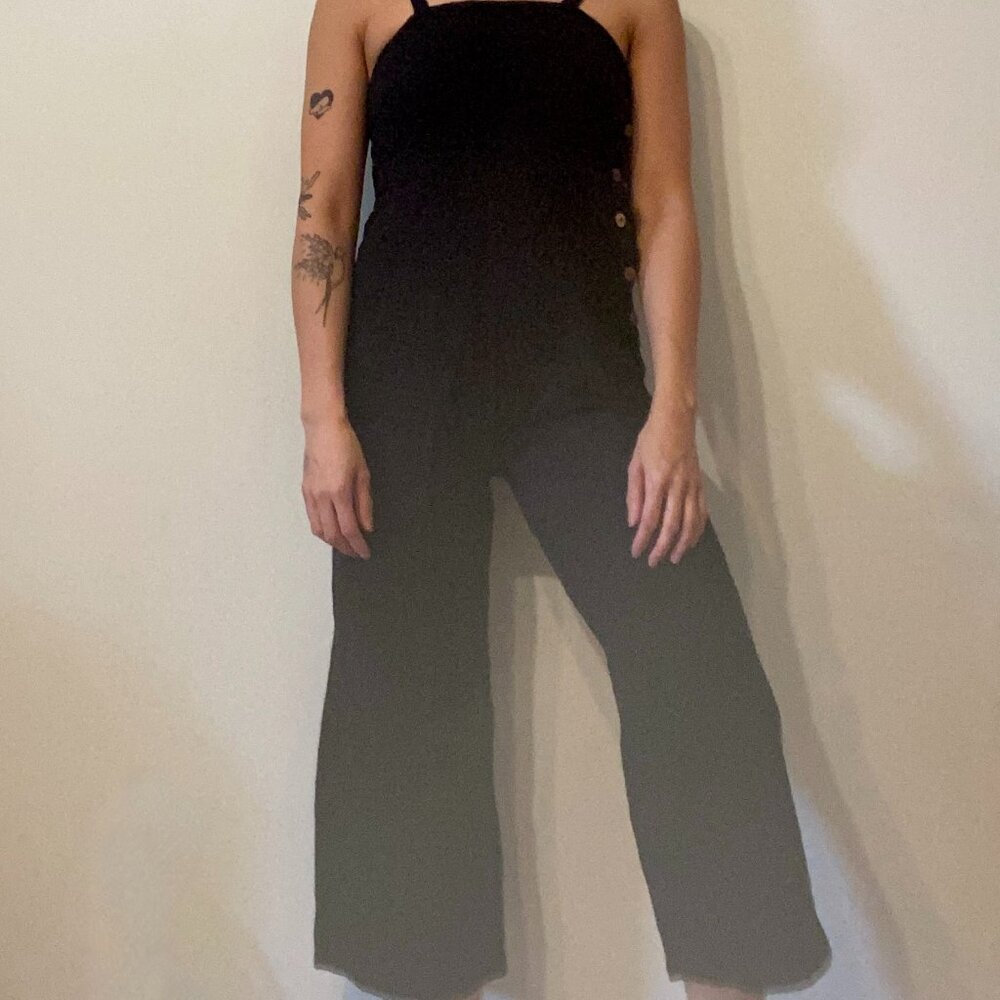 Textured jumpsuit with side buttons